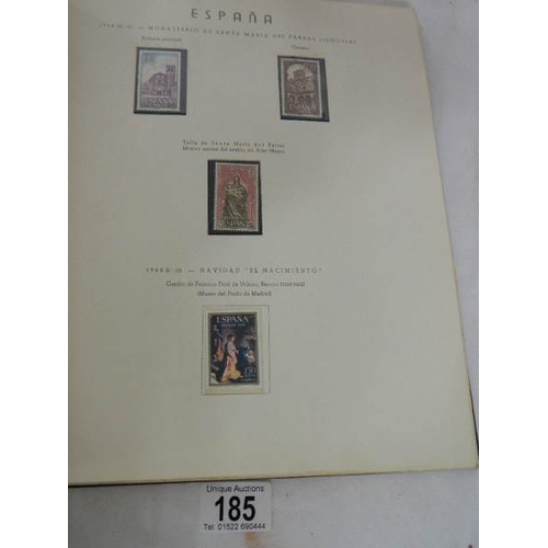 185 - A good collection of Spanish stamps in 5 albums plus reference books.