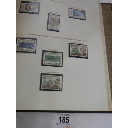 185 - A good collection of Spanish stamps in 5 albums plus reference books.