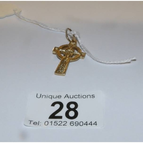 28 - A 9ct gold cross pendant, 3.8 grams.