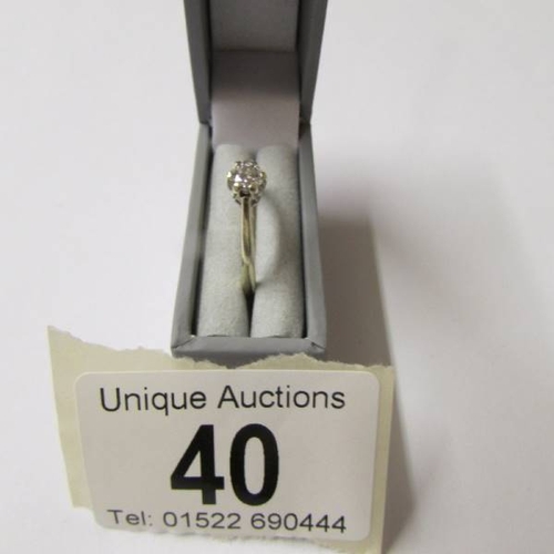 40 - A diamond single stone 0.25ct ring in a 9ct gold shank, size K half.