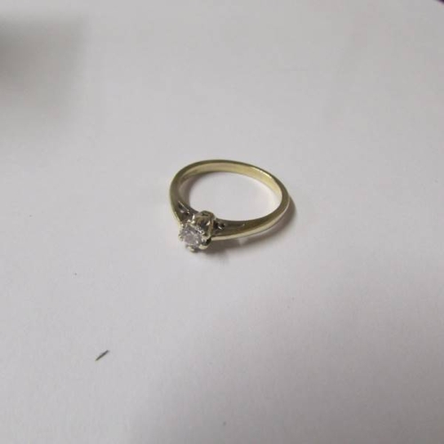 40 - A diamond single stone 0.25ct ring in a 9ct gold shank, size K half.