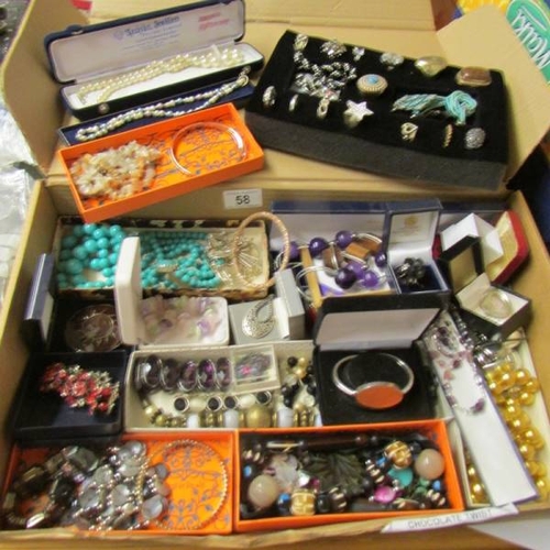 58 - A large quantity of various rings, brooches etc.,