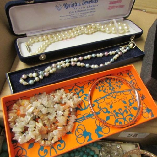 58 - A large quantity of various rings, brooches etc.,