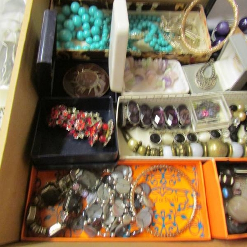 58 - A large quantity of various rings, brooches etc.,