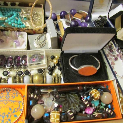 58 - A large quantity of various rings, brooches etc.,