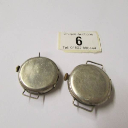 6 - 2 vintage silver watch heads, a/f.