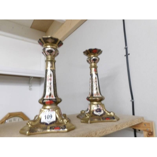 109 - A pair of China candlesticks.