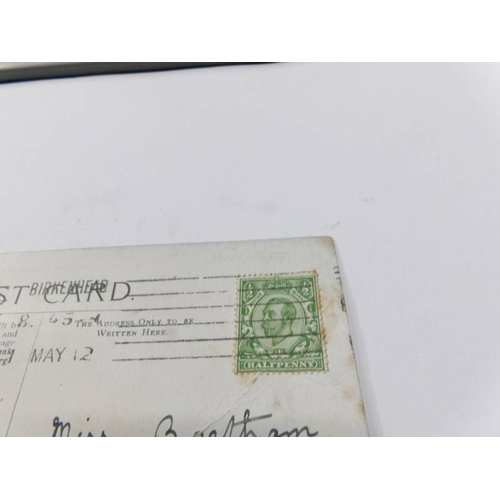 132 - A R.M.S Titanic postcard with postmark for 1st May 1912.  (has been bent at corner.).