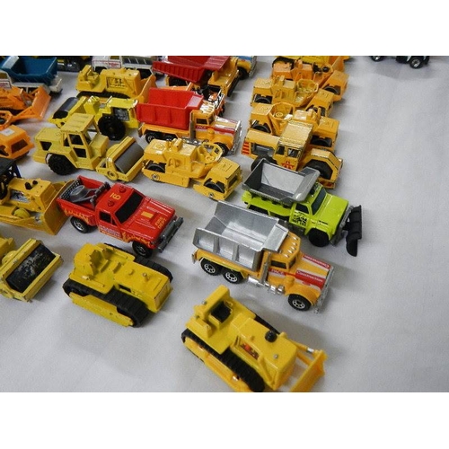 151 - Approximately 75 construction themed die cast vehicles.