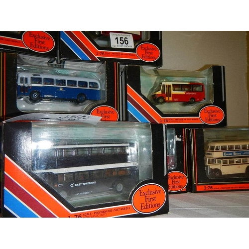 156 - Eight die cast Corgi bus models.