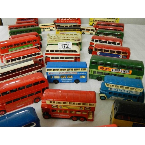 172 - A good lot of various die cast double decker buses.