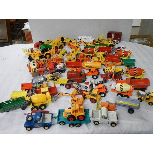 179 - Approximately 68 construction and farming related die cast models.