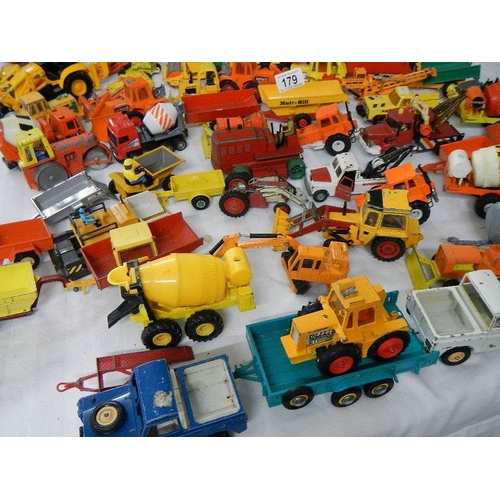 179 - Approximately 68 construction and farming related die cast models.