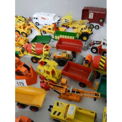 179 - Approximately 68 construction and farming related die cast models.