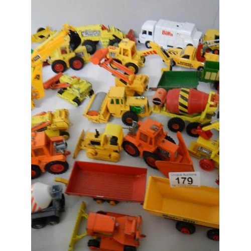 179 - Approximately 68 construction and farming related die cast models.