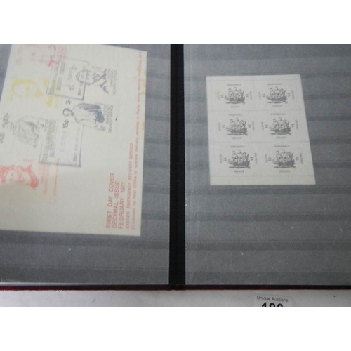 180 - 2 albums of worldwide Cinderella and back of book stamps.