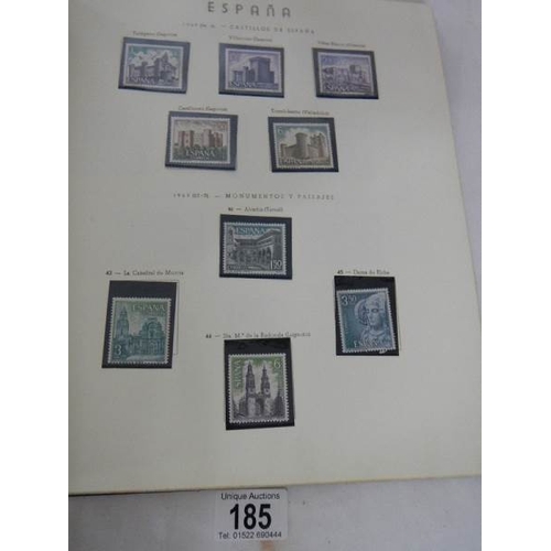 185 - A good collection of Spanish stamps in 5 albums plus reference books.