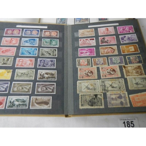 185 - A good collection of Spanish stamps in 5 albums plus reference books.