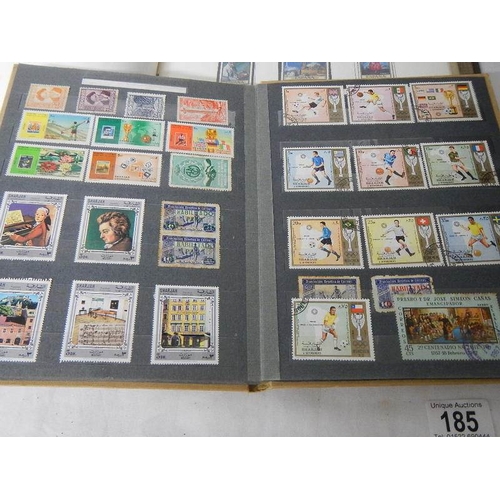 185 - A good collection of Spanish stamps in 5 albums plus reference books.