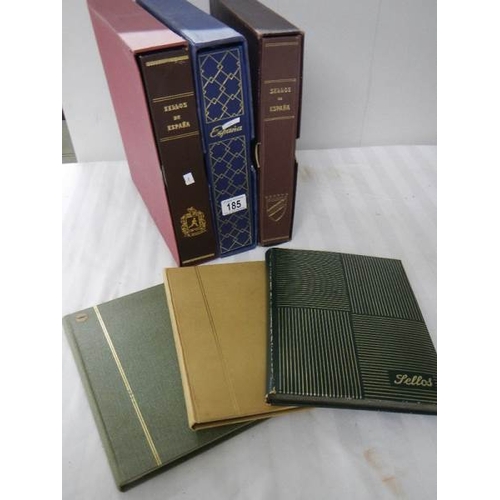 185 - A good collection of Spanish stamps in 5 albums plus reference books.