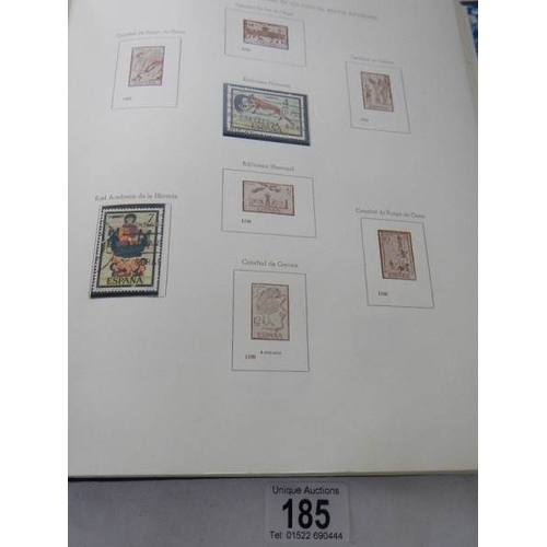 185 - A good collection of Spanish stamps in 5 albums plus reference books.