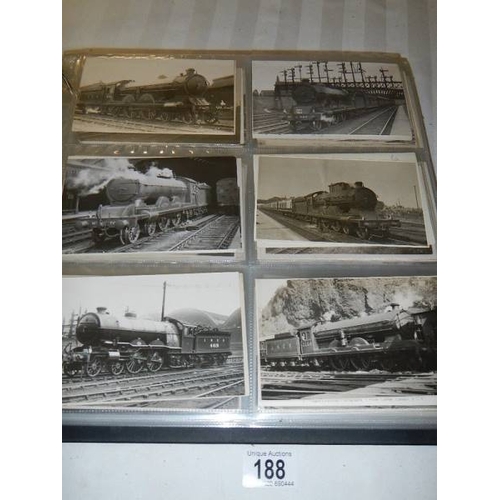 188 - An album of in excess of 500 railway related postcards and photographs.