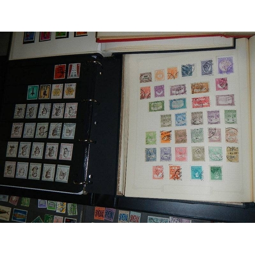 190 - Ten albums of worldwide stamps, mint & used, early to mid 20th century.