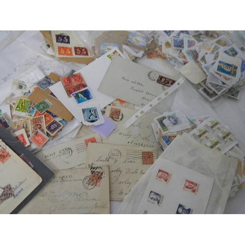 195 - A large quantity of stamps and envelopes.