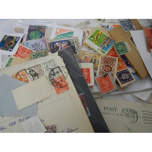 195 - A large quantity of stamps and envelopes.