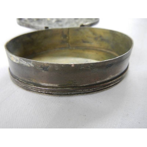 200 - An old silver plate on copper snuff box with embellished top.