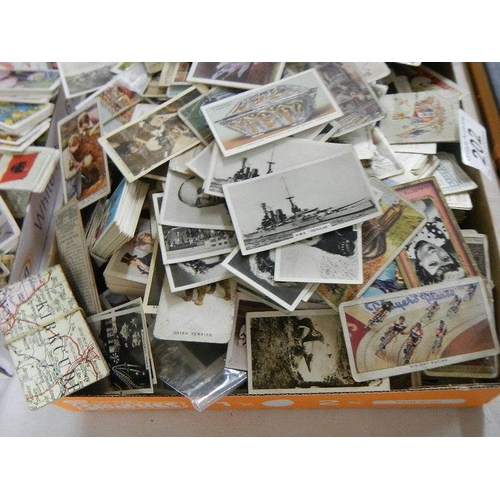 202 - Approximately 200 loose tea and cigarette cards including Wills, Players, Gallaher etc.,