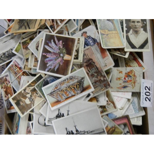 202 - Approximately 200 loose tea and cigarette cards including Wills, Players, Gallaher etc.,