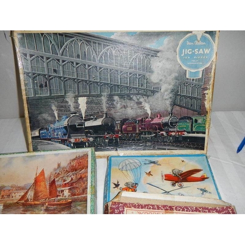 203 - A quantity of vintage wooden jigsaw puzzles.