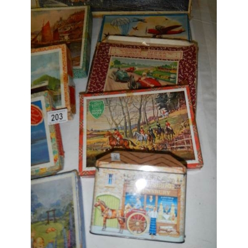 203 - A quantity of vintage wooden jigsaw puzzles.