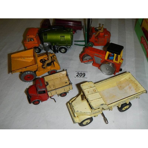 209 - A quantity of Dinky commercial vehicles including Bedford, road roller etc.,