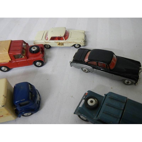 214 - 9 Corgi toys including Land Rover, Heinkel, Bentley etc.,