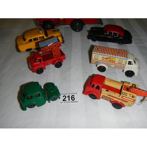 216 - A quantity of tinplate and plastic friction toys including Mettoy.