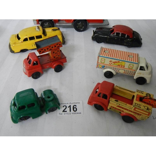 216 - A quantity of tinplate and plastic friction toys including Mettoy.