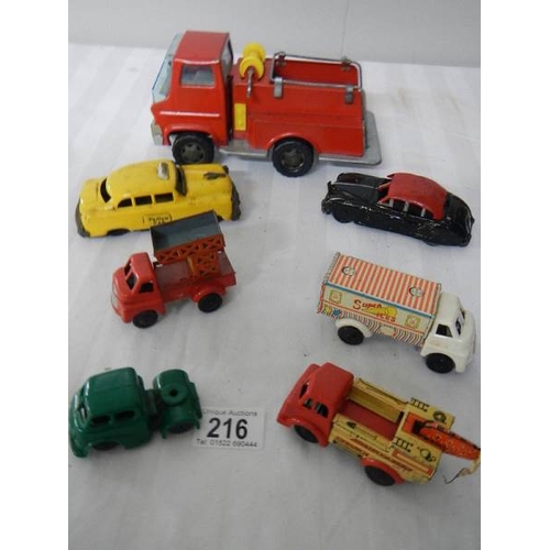 216 - A quantity of tinplate and plastic friction toys including Mettoy.