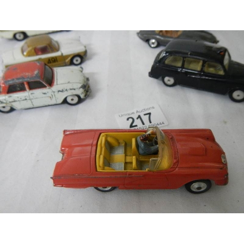 217 - 8 Corgi toys including Ford, Triumph, Jaguar etc.,