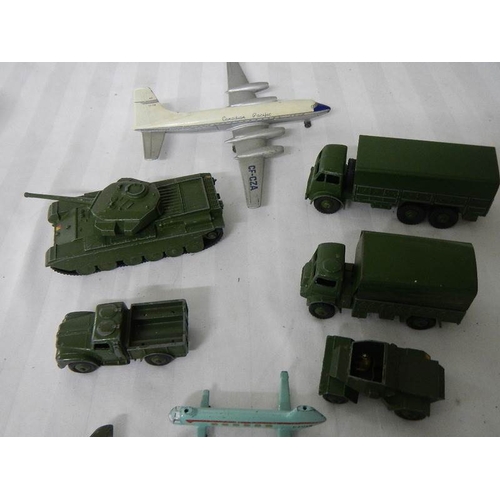 219 - A quantity of Dinky military vehicles including aircraft.