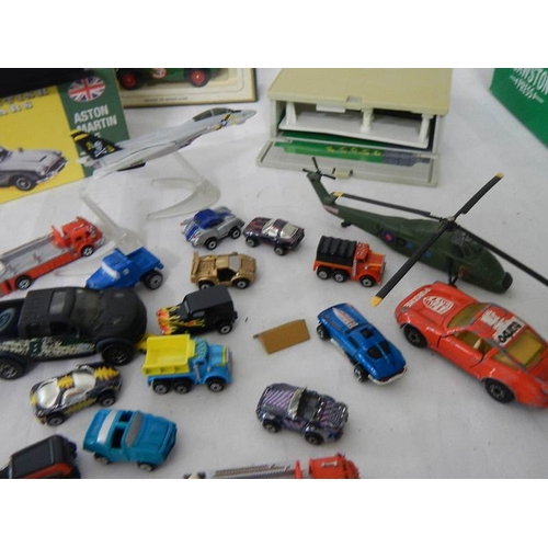 222 - A small quantity of micro machines including folding garage.