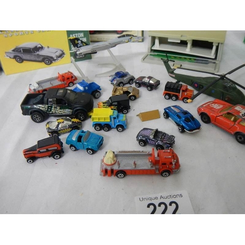 222 - A small quantity of micro machines including folding garage.