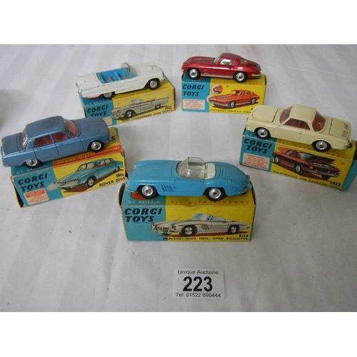 223 - 5 boxed Corgi toys Nos 215s, 239, 252, 303, 310, Ford, Rover, Mercedes etc., in original boxes, some... 