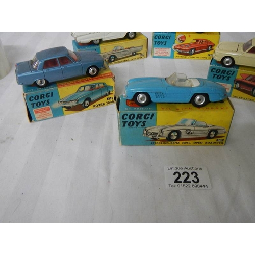 223 - 5 boxed Corgi toys Nos 215s, 239, 252, 303, 310, Ford, Rover, Mercedes etc., in original boxes, some... 