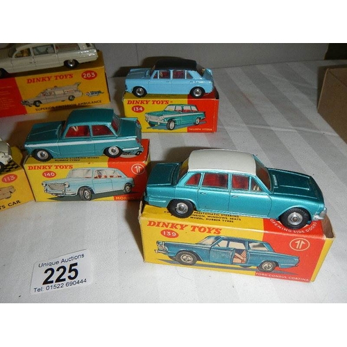 225 - 7 boxed Dinky cars, 2 over painted, others in reasonable condition, all with original boxes, some wi... 