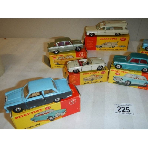 225 - 7 boxed Dinky cars, 2 over painted, others in reasonable condition, all with original boxes, some wi... 