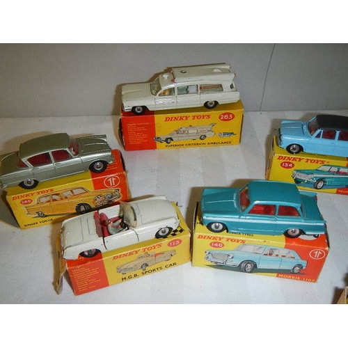 225 - 7 boxed Dinky cars, 2 over painted, others in reasonable condition, all with original boxes, some wi... 