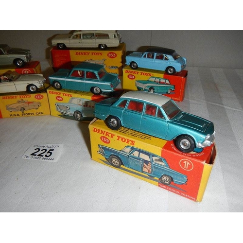 225 - 7 boxed Dinky cars, 2 over painted, others in reasonable condition, all with original boxes, some wi... 