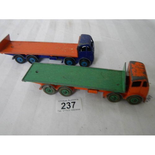 237 - A Dinky type 2 Fodens flat truck one with tailboard and the other a flat truck.